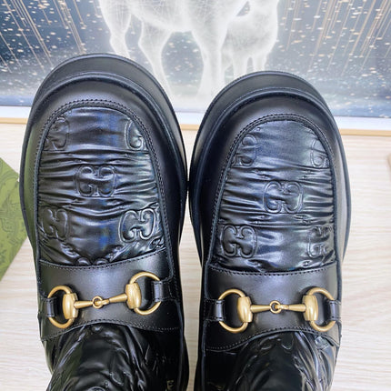 HORSEBIT ANKLE BOOTS WITH MERINO TRIM IN BLACK EMBOSSED CALFSKIN