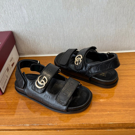 GG SANDALS S25 IN BLACK LAMBSKIN EMBOSSED LOGO WITH GOLD HARDWARE
