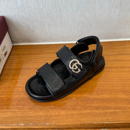 GG SANDALS S25 IN BLACK LAMBSKIN EMBOSSED LOGO WITH GOLD HARDWARE