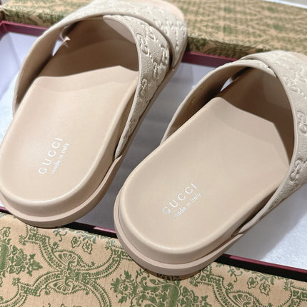 GG SLIDES IN NUDE BEIGE SUEDE WITH EMBOSSED LOGO STYLE 7