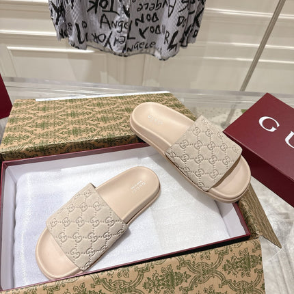 GG SLIDES IN NUDE BEIGE SUEDE WITH EMBOSSED LOGO STYLE 2