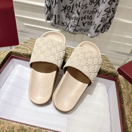 GG SLIDES IN NUDE BEIGE SUEDE WITH EMBOSSED LOGO STYLE 2