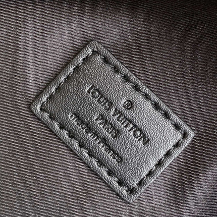 DISCOVERY BACKPACK 38 IN BLACK MONOGRAM ECLIPSE CANVAS AND TAURILLON