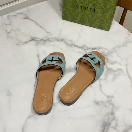 INTERLOCKING G SLIDE SANDAL IN MORNING BLUE SUEDE AND BROWN SHEEPSKIN LINING