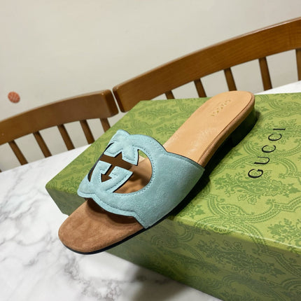 INTERLOCKING G SLIDE SANDAL IN MORNING BLUE SUEDE AND BROWN SHEEPSKIN LINING