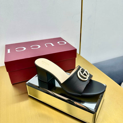 GG HIGH HEELS IN BLACK CALFSKIN GOLD-TONE HARDWARE WITH RHINESTONES