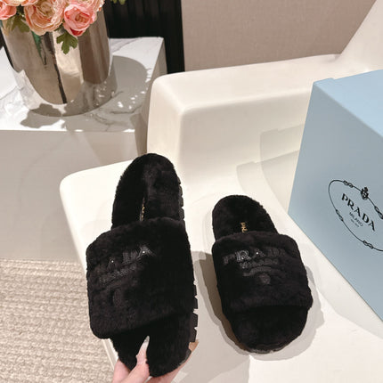 PRADA 25S FLAT MULES IN BLACK RABBIT FUR