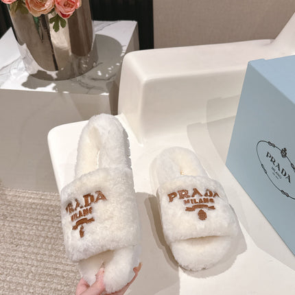PRADA 25S FLAT MULES IN WHITE RABBIT FUR