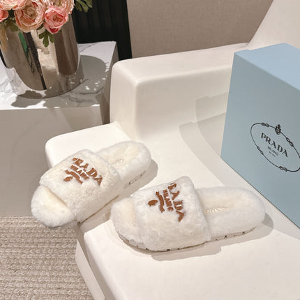 PRADA 25S FLAT MULES IN WHITE RABBIT FUR