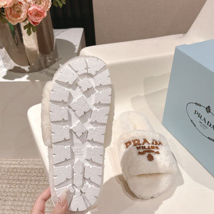 PRADA 25S FLAT MULES IN WHITE RABBIT FUR