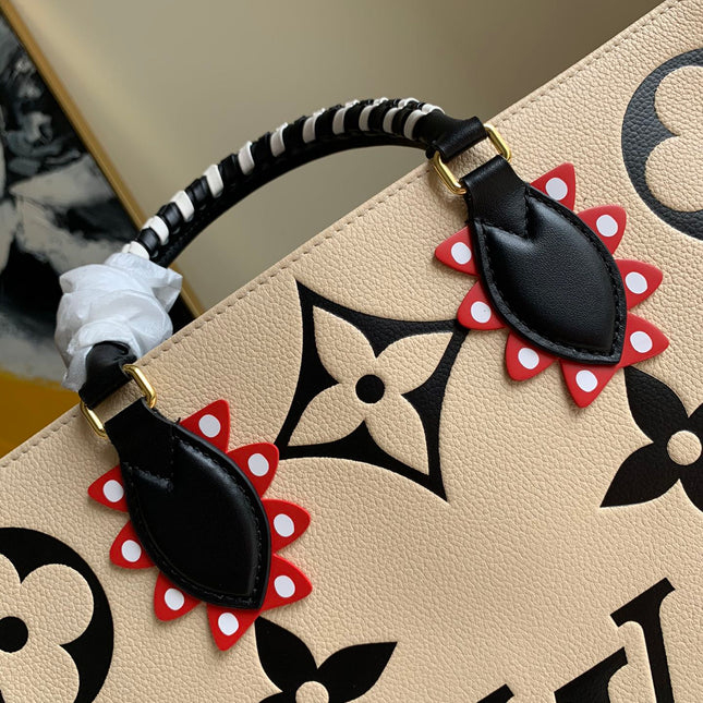 CRAFTY ONTHEGO GM 41 CREME BLACK MONOGRAM GIANT CANVAS
