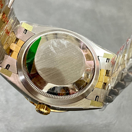 DATEJUST 31MM GOLD STEEL DIAMOND BEZEL GREEN DIAL