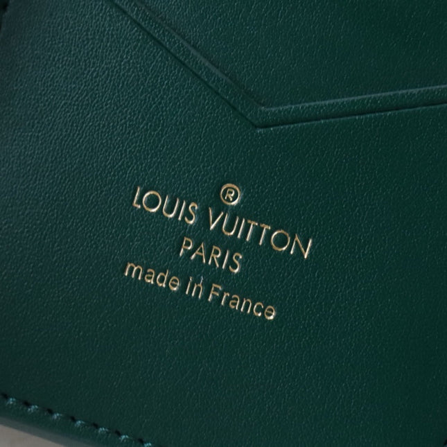 VERTICAL COMPACT WALLET GREEN CAPUCINES
