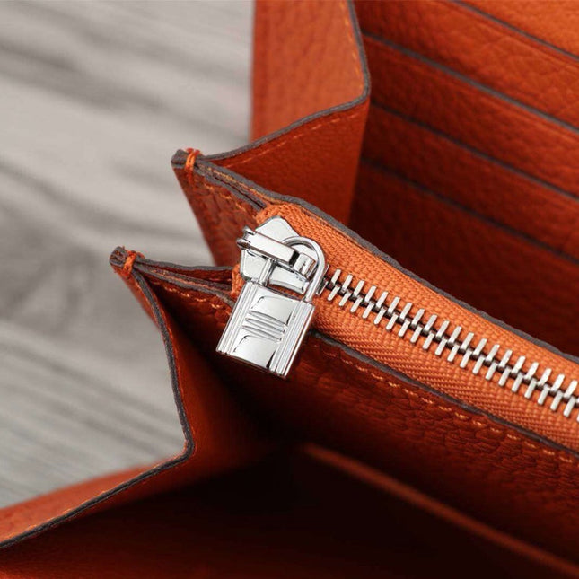 HM CLUTCH CONSTANCE 20.5 ORANGE CALFSKIN SILVER HARDWARE