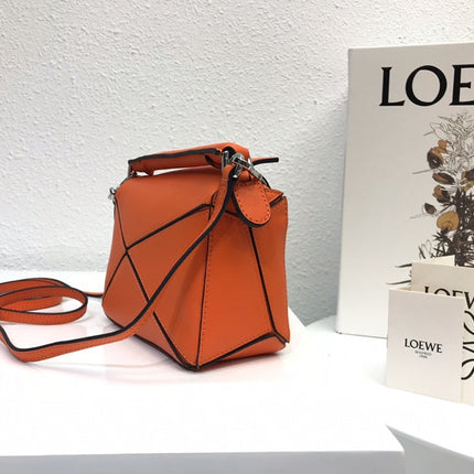 LOE MINI 18 PUZZLE BAG IN VIVID ORANGE CALFSKIN