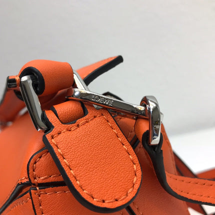 LOE MINI 18 PUZZLE BAG IN VIVID ORANGE CALFSKIN