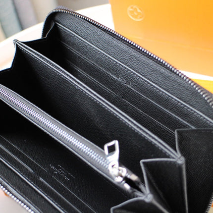 LV 25S ZIPPY WALLET HORIZONTAL 19 IN MONOGRAM ECLIPSE COATED CALFSKIN