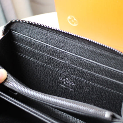 LV 25S ZIPPY WALLET HORIZONTAL 19 IN MONOGRAM ECLIPSE COATED CALFSKIN