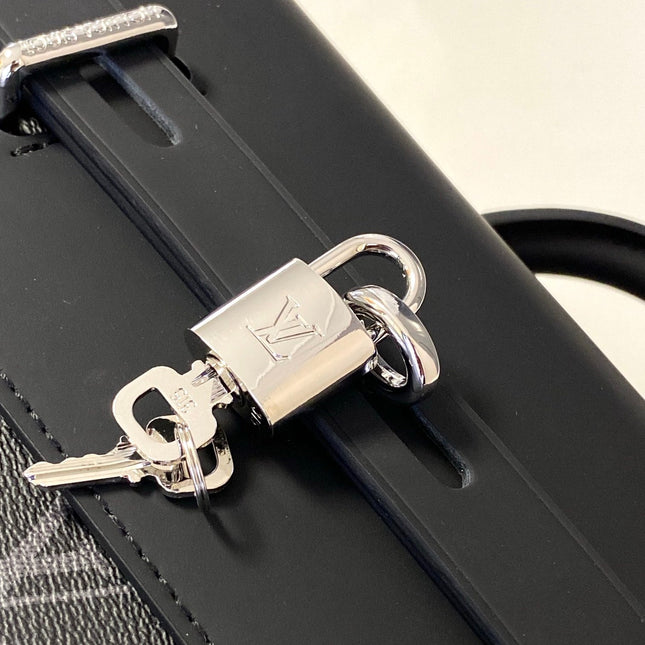 STEAMER BACKPACK 45 IN GUN METAL MONOGRAM ECLIPSE CANVAS AND BLACK CALFSKIN SILVER BUCKLE