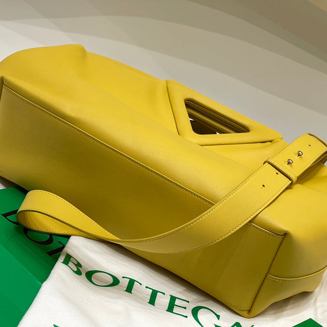 TRIANGLE HANDLE BAG 31 IN DANDELION YELLOW LAMBSKIN