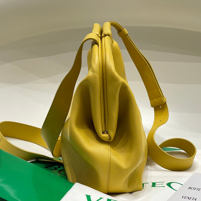 TRIANGLE HANDLE BAG 31 IN DANDELION YELLOW LAMBSKIN