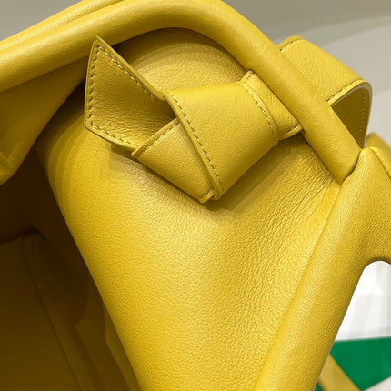 TRIANGLE HANDLE BAG 31 IN DANDELION YELLOW LAMBSKIN