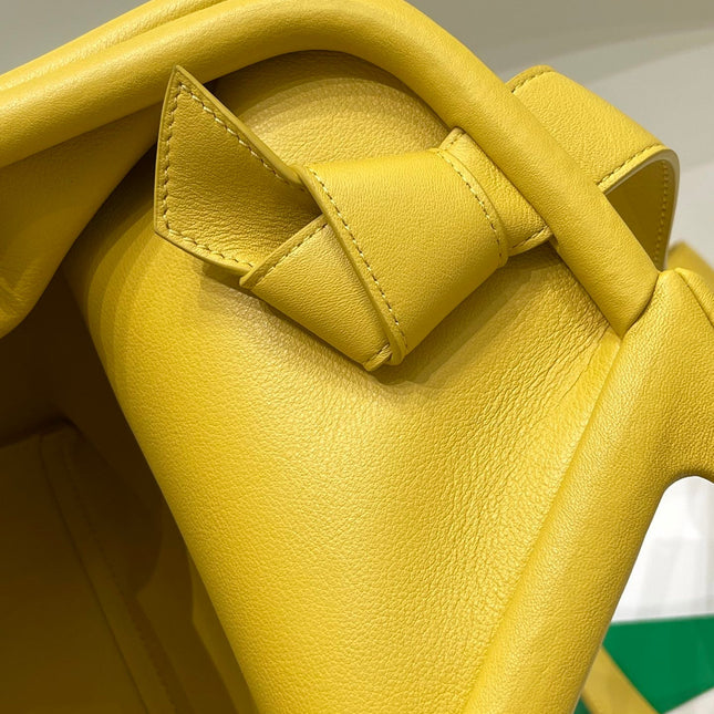 TRIANGLE HANDLE BAG 31 IN DANDELION YELLOW LAMBSKIN