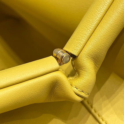 TRIANGLE HANDLE BAG 31 IN DANDELION YELLOW LAMBSKIN