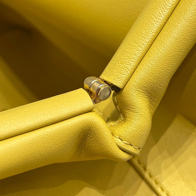 TRIANGLE HANDLE BAG 31 IN DANDELION YELLOW LAMBSKIN