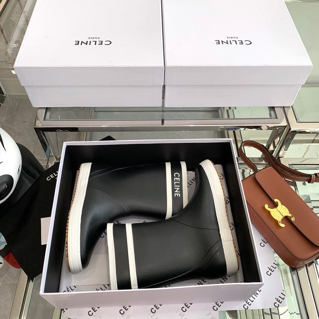 RAIN BOOTS IN BLACK MIX WHITE RUBBER