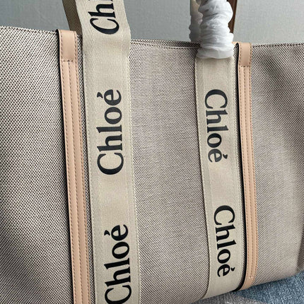 LAGRE WOODY TOTE BAG 45 IN BEIGE LINEN CANVAS BLACK WEBBING LOGO EMBROIDER NUDE CALFSKIN