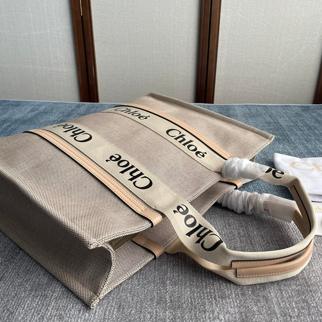 LAGRE WOODY TOTE BAG 45 IN BEIGE LINEN CANVAS BLACK WEBBING LOGO EMBROIDER NUDE CALFSKIN