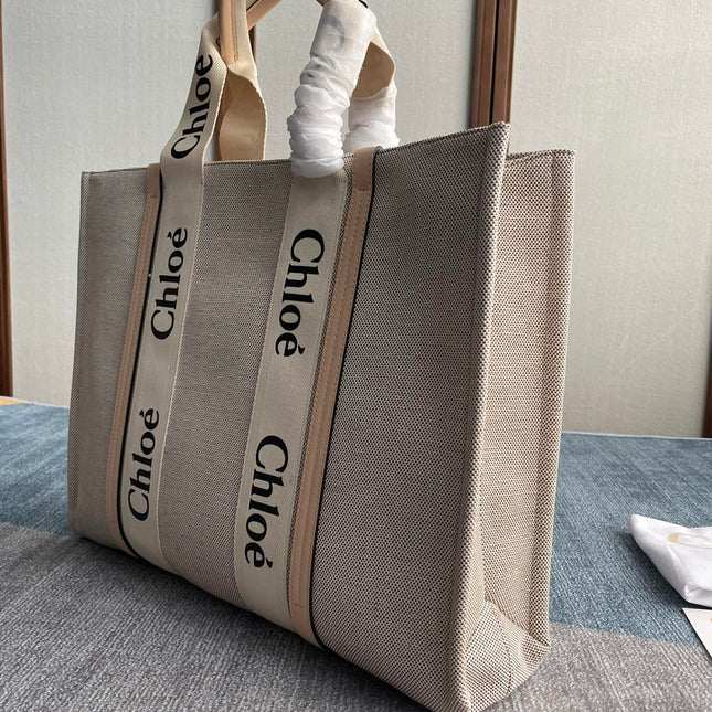 LAGRE WOODY TOTE BAG 45 IN BEIGE LINEN CANVAS BLACK WEBBING LOGO EMBROIDER NUDE CALFSKIN