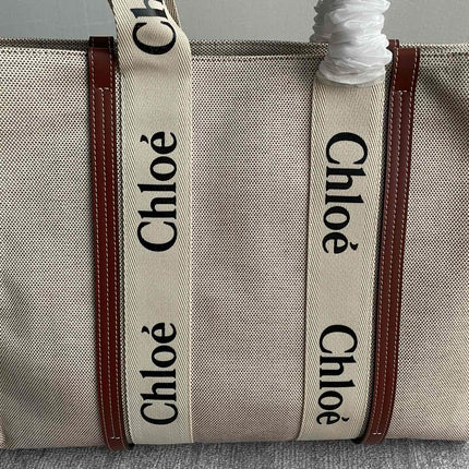 LAGRE STRAP WOODY TOTE BAG 45 IN BEIGE LINEN CANVAS BLACK WEBBING LOGO EMBROIDER BROWN CALFSKIN