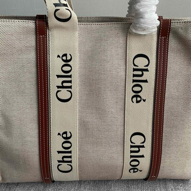 LAGRE STRAP WOODY TOTE BAG 45 IN BEIGE LINEN CANVAS BLACK WEBBING LOGO EMBROIDER BROWN CALFSKIN