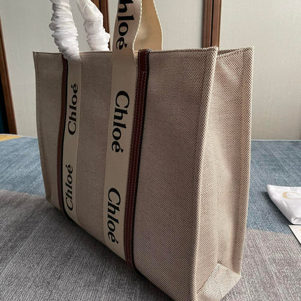 LAGRE STRAP WOODY TOTE BAG 45 IN BEIGE LINEN CANVAS BLACK WEBBING LOGO EMBROIDER BROWN CALFSKIN