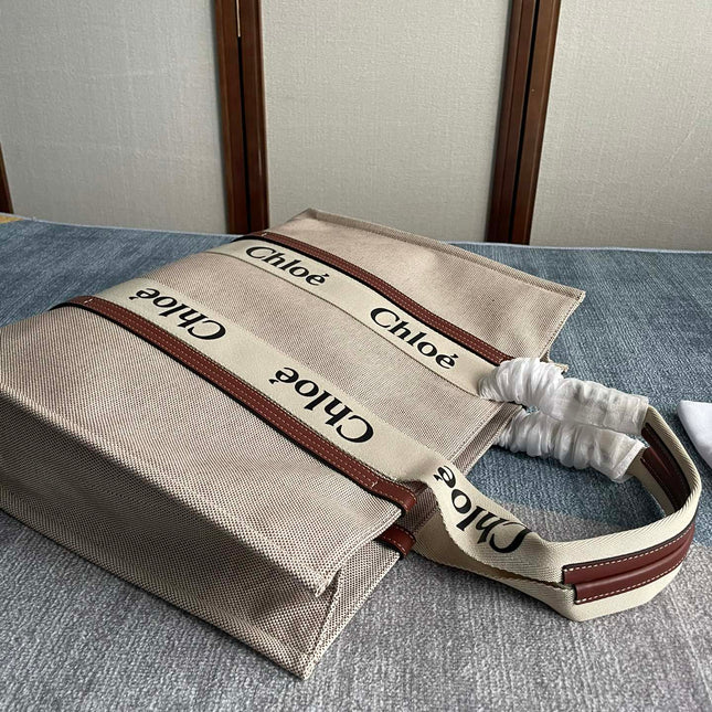 LAGRE STRAP WOODY TOTE BAG 45 IN BEIGE LINEN CANVAS BLACK WEBBING LOGO EMBROIDER BROWN CALFSKIN