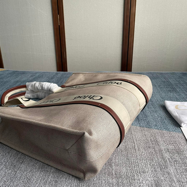 LAGRE STRAP WOODY TOTE BAG 45 IN BEIGE LINEN CANVAS BLACK WEBBING LOGO EMBROIDER BROWN CALFSKIN