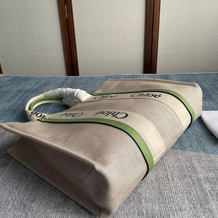 LAGRE WOODY TOTE BAG 45 IN BEIGE LINEN CANVAS BLACK WEBBING LOGO EMBROIDER GREEN CALFSKIN