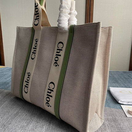 LAGRE WOODY TOTE BAG 45 IN BEIGE LINEN CANVAS BLACK WEBBING LOGO EMBROIDER GREEN CALFSKIN