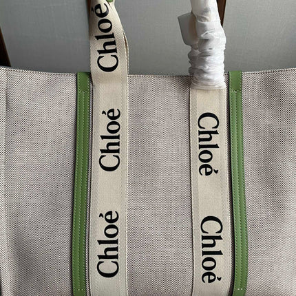 LAGRE WOODY TOTE BAG 45 IN BEIGE LINEN CANVAS BLACK WEBBING LOGO EMBROIDER GREEN CALFSKIN