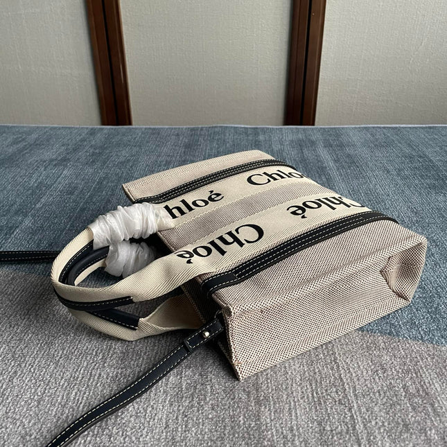 SMALL STRAP WOODY TOTE BAG 26.5 IN BEIGE LINEN CANVAS BLACK WEBBING LOGO EMBROIDER BLACK CALFSKIN