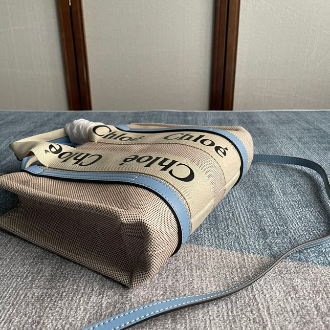 SMALL STRAP WOODY TOTE BAG 26.5 IN BEIGE LINEN CANVAS BLACK WEBBING LOGO EMBROIDER BLUE CALFSKIN