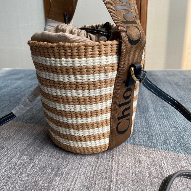 SMALL WOODY BASKET 17 IN BROWN AND WHITE FIBERS BROWN WEBBING BLACK CALFSKIN