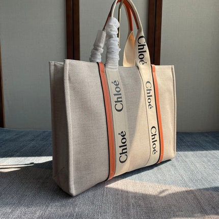 LAGRE WOODY TOTE BAG 45 IN BEIGE LINEN CANVAS BLACK WEBBING LOGO EMBROIDER ORANGE CALFSKIN