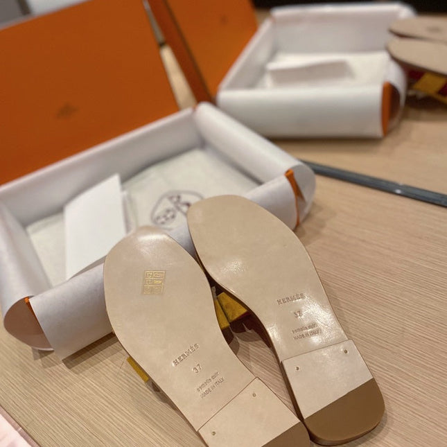 0RAN SANDALS IN DIJON YELLOW SUEDE AND DEEP PINK CALFSKIN