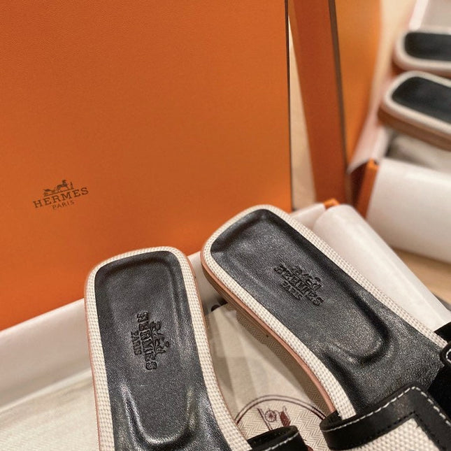 0RAN SANDALS IN BLACK CALFSKIN AND WHITE CANVAS