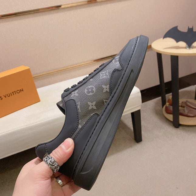 LV TRAINER IN BLACK MIX DARK BROWN CALFSKIN