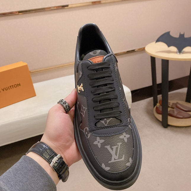 LV TRAINER IN BLACK MIX DARK BROWN CALFSKIN