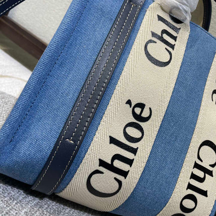 SMALL STRAP WOODY TOTE BAG 26.5 IN BLUE DENIM CANVAS DARK BLUE CALFSKIN